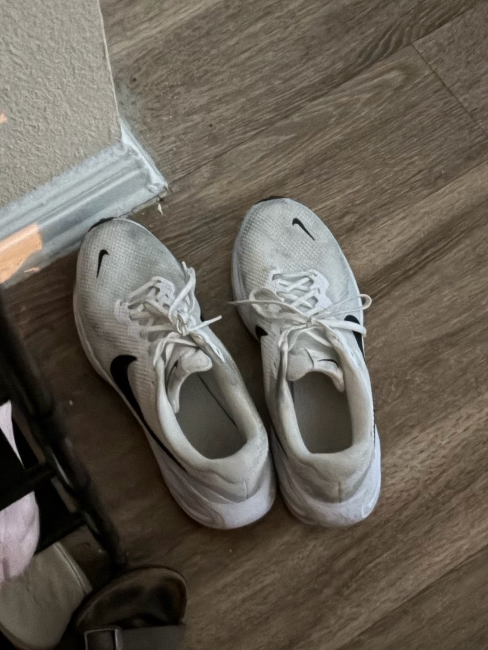 Nike Kids White Sneakers with Black Swoosh